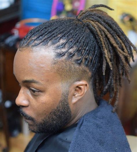 dread ponytail men|unique dread styles for men.